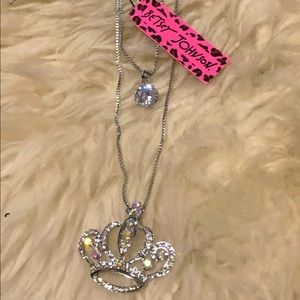 Betsey Johnson long silver necklace.